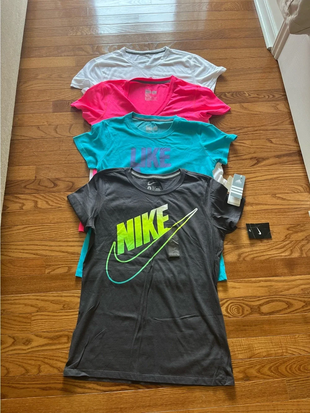 Nike ladies Short Sleeve Tee Stack - Black, Teal, Pink, White